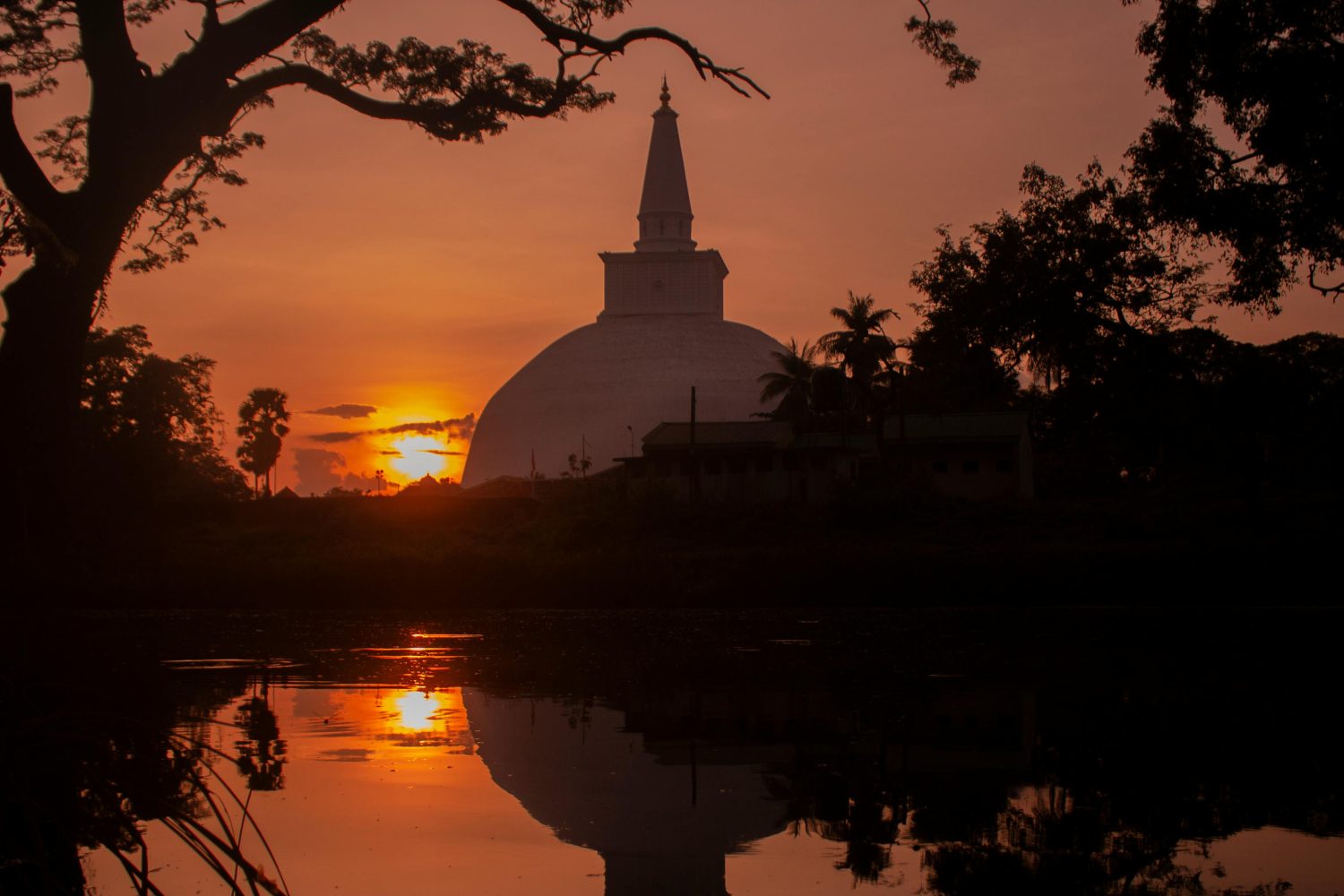 Stuning Sunrise through ancient ruins in Anuradhapura Sri Lanka