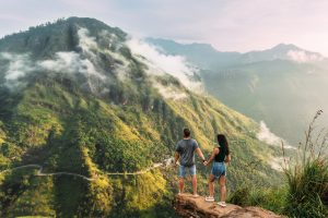 couple in Ella Sri Lanka overlooking ella rock.