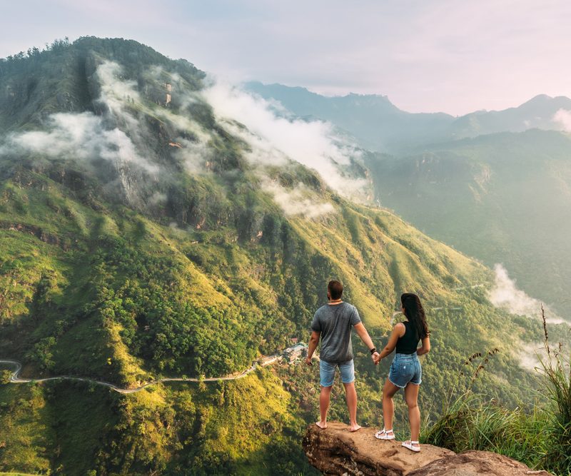 couple in Ella Sri Lanka overlooking ella rock.